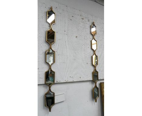 ARCHITECTURAL ACCENT MIRRORS, two, 147.5cm x 13.5cm, gilt metal frames. 