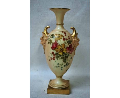 A Royal Worcester blush ivory bone china Vase, ovoid form with a pair of satyr mask handles, circa 1909, painted with floral 