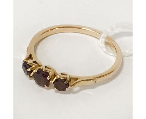 21CT GOLD &amp; GARNET TRILOGY RING