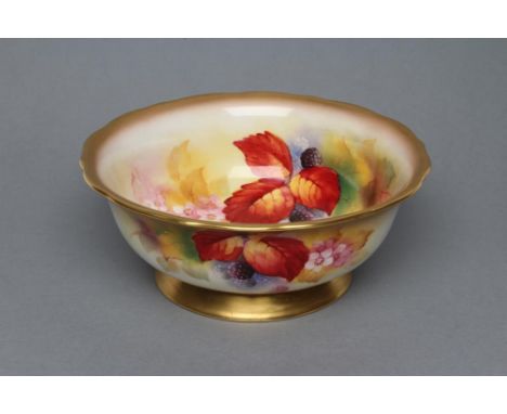 A ROYAL WORCESTER CHINA BOWL, 1933, of everted circular form with shaped rim, internally and externally painted in typical pa
