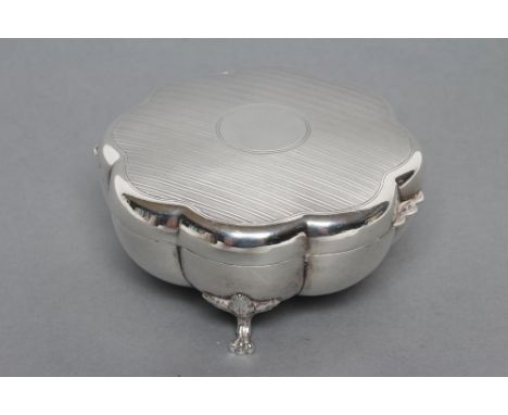 AN EDWARDIAN DRESSING TABLE BOX, maker Goldsmiths & Silversmiths Co. Ltd., London 1911, of lobed circular form, raised upon f