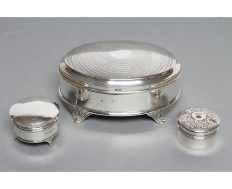 A DRESSING TABLE BOX, possibly J. Culver Ld., probably Birmingham 1934, of oval form, the hinged cover with engine turning en