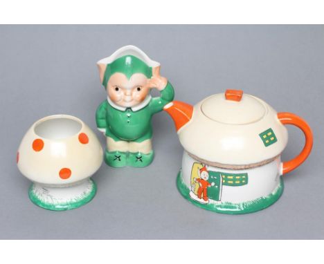 MABEL LUCIE ATTWELL FOR SHELLEY, an Art Deco pottery three piece nursery set comprising Toadstool teapot and cover and sugar 