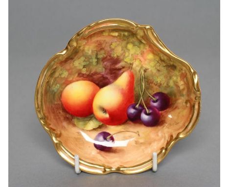 A ROYAL WORCESTER CHINA PIN TRAY, 1933, of shaped circular form, painted in colours by Harry Ayrton with a still life of pear