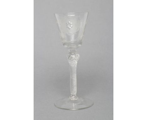 A JACOBITE WINE GLASS, mid 18th century, the round funnel bowl engraved with a rose and star, on shoulder knop and multi spir