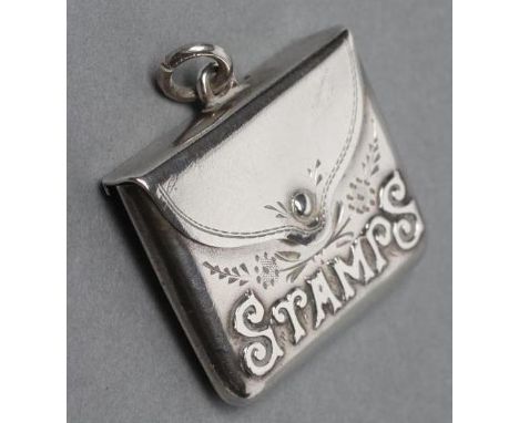 A SILVER NOVELTY STAMP CASE, maker Crisford & Norris, Birmingham 1912, the hinged envelope with floral engraving, with hangin