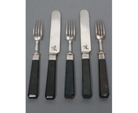 TWO PAIRS OF DESSERT KNIVES AND FORKS, the plated blades and tines engraved with a crest by Martin, Hall & Co., on polished b