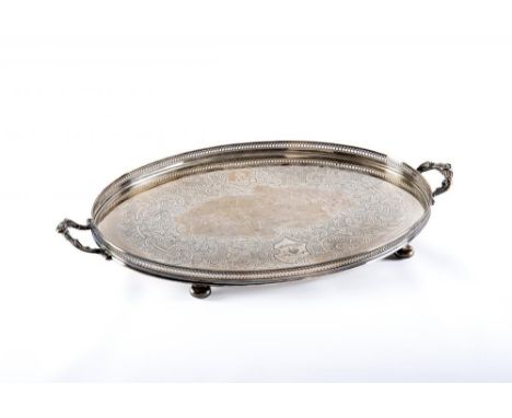 AN EDWARDIAN TRAY, maker Walker & Hall, Sheffield 1902, of oval form with arcade pierced gallery and two reeded scroll handle