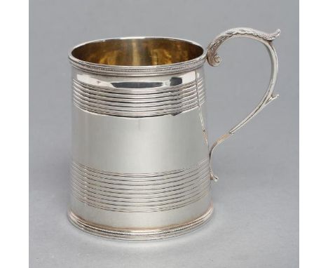 AN EARLY VICTORIAN MUG, maker John & Henry Lias, London 1840, of plain tapering cylindrical form with two bands of engine tur