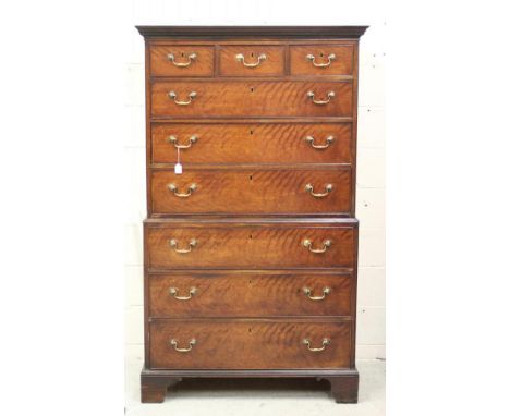 A GEORGIAN MAHOGANY CHEST ON CHEST, c.1800, the dentil moulded cornice over three small frieze drawers and three long drawers