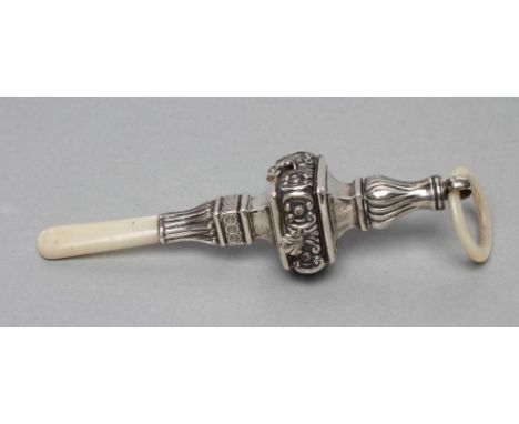 AN EDWARDIAN SILVER RATTLE, maker Crisford & Norris, Birmingham 1907, of square baluster form stamped with scrolls and with m