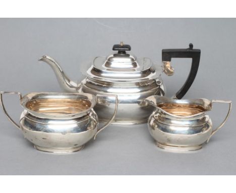 A THREE PIECE TEA SERVICE, maker Harrison, Fisher & Co., Sheffield 1936 (teapot) and 1937, of rounded oblong baluster form, c