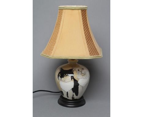 A MOORCROFT POTTERY TABLE LAMP BASE, modern, of ovoid form, tubelined and painted in black and white with two seated cats on 