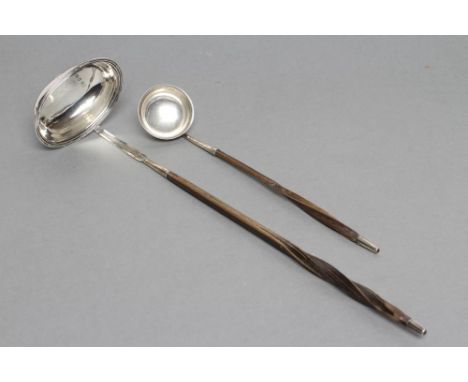 A LATE GEORGE III PUNCH LADLE, maker probably E. Morley, London 1789, the plain oval bowl with applied reeded rim and engrave