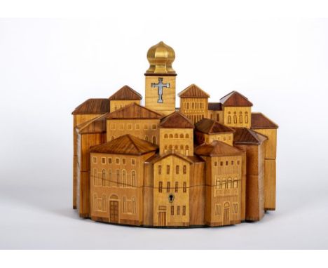 JOHN S PRESCOTT (Yorkshire b.1938), an inlaid exotic wood jewellery box modelled as an Eastern European townscape, the hinged