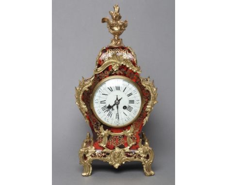 A LOUIS XV STYLE MANTEL CLOCK, 20th century, the French eight day movement with anchor escapement striking on a gong, 4 1/2" 