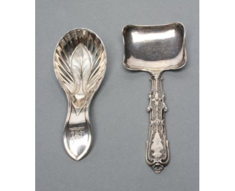 A GEORGE III SILVER CADDY SPOON, maker John Young & Sons, Sheffield 1805, with leaf bowl, the handle engraved with a crest, 3