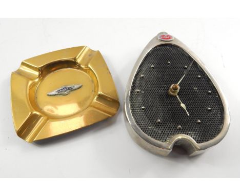 A Bugatti radiator table clock, (quartz movement), 16cm high, and a Lagonda brass ashtray. (2)