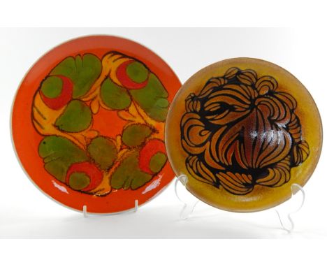 A Poole pottery plate decorated in a Delphis pattern, 25.5cm diameter, and a further plate decorated in an Aegean pattern, 20