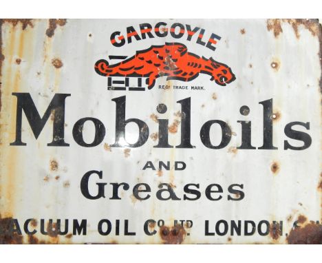 A Gargoyle Mobile Oil and Grease Vacuum Oil Company Ltd London enamel sign,  76cm x 107cm.