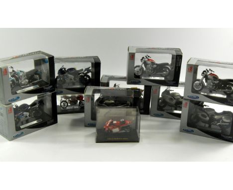 A quantity of Welly die cast models of motorbikes, scale 1:18, boxed, comprising; three Triumph Trophies, two Triumph Thunder