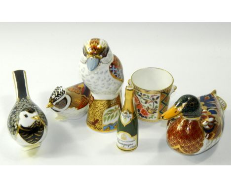 A group of Royal Crown Derby porcelain imari paperweights, gold button, comprising; Crested Tit, Kookaburra, Mallard and a Pi