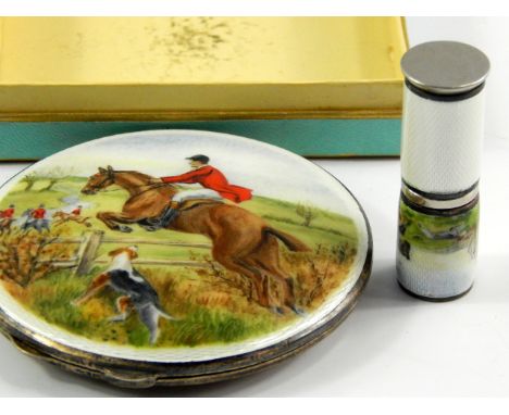 A silver and enamel compact and matching lipstick, decorated with hunting scenes against a white guilloche enamel ground, Bir