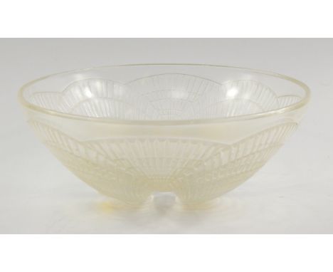 An R Lalique glass bowl decorated in the Coquilles pattern, clear and opalescent glass, etched mark, 23.5cm diameter, 9.5cm h