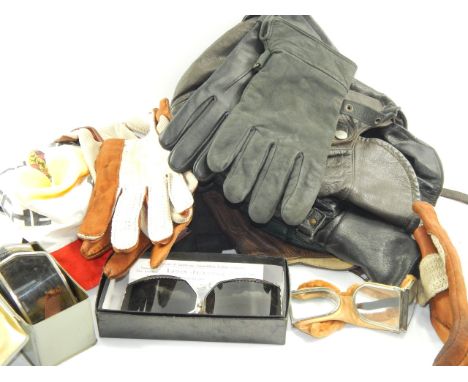 Vintage and modern leather racing helmets, and three pairs of goggles, including sets by Leon Jeantet, another set marked Bre