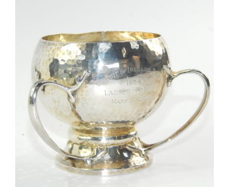 Miss Mary Walker. 1954 Circuit of Ireland Trial Ladies trophy, being a planished silver three handled cup.