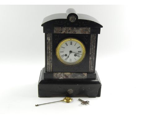 A Victorian marble and slate mantel clock, of architectural form, enamel dial bearing Roman numerals, eight day movement by M