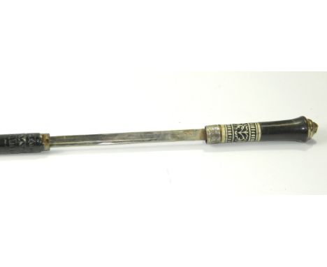 An Indian ebony sword stick, the white metal knop cast as a lion's head, foliate carved bone ferule, 92cm long.