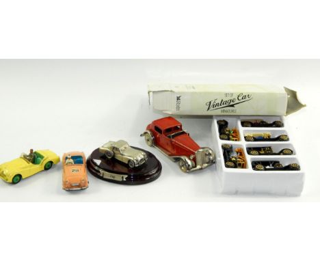 A set of The Vintage Car miniatures, Tri-ang Minic Toys clockwork Sedan car, Dinky Triumph TR2, (2), another, and a quantity 