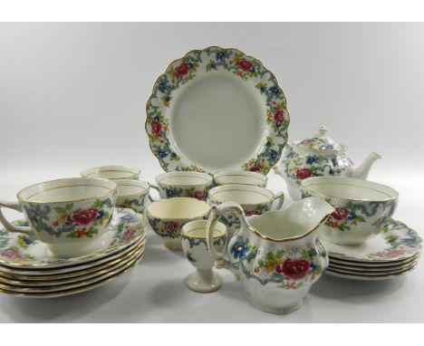 A Booths pottery part tea service decorated in the Floradora pattern, comprising; teapot, cream jug, two sugar bowls, bread p