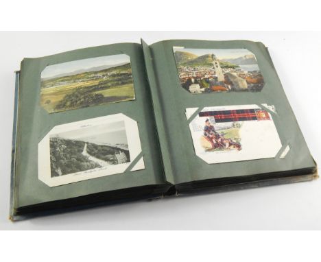 A postcard album, containing Edwardian topographical and sentimental postcards, and a set of W & A K Johnston Ltd Clans cards