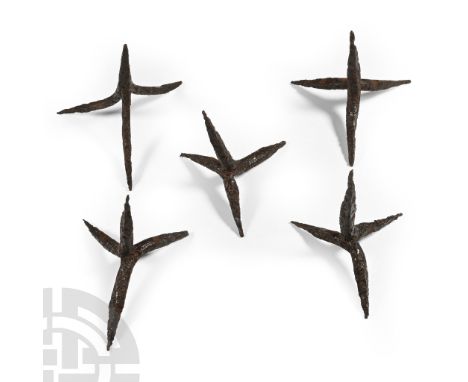 13th-14th century A.D. Each hand-forged with square-section spikes, designed so that however the item falls, one spike is alw