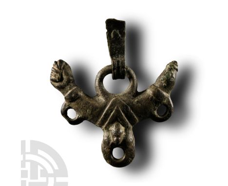 1st-2nd century A.D. Amuletic fascinum formed as a crescent with phallus to the right, hand in the fica gesture to the left a