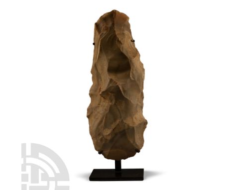 Neolithic Period, 5500-2200 B.P. Core tool, roughly hewn on all sides with cortex remains on the narrow end; relatively symme