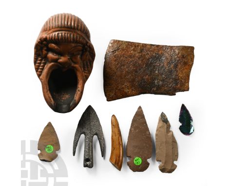 20th century A.D. Including iron axehead, swallowtail arrowhead, Roman style oil lamp and other items.  440 grams total, 35-9