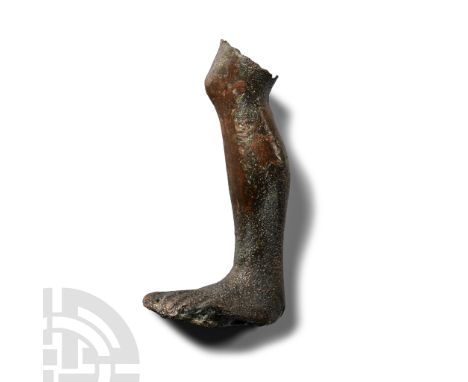 1st-4th century A.D. Hollow-formed left leg and foot from a statuette; possibly used as a votive for medical reasons. Cf. lif