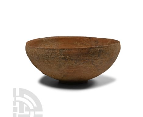 1st millennium B.C. Featuring a wide shallow body and a small raised disc foot.  462 grams, 19 cm (7 1/2 in.). [No Reserve] E