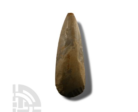 Neolithic Period, circa 6000 B.P. Teardrop-shaped with narrow butt, rounded sides and deep curved edge; mottled surface.  443