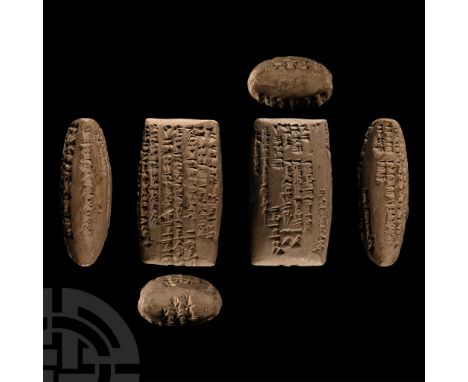 Circa 600 B.C. Pillow-shaped tablet with cuneiform text identified as 'irbu-income of dates from five people, with additional