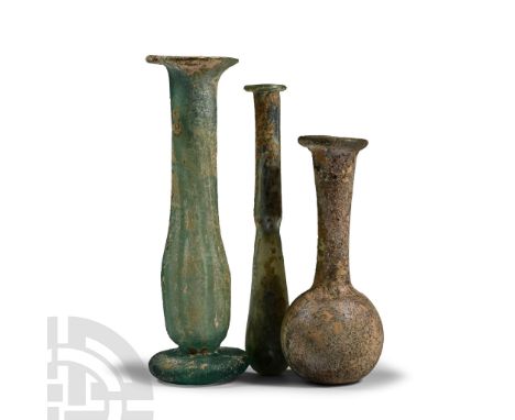 1st century A.D. Comprising three unguentaria, one with an applied disc foot. Cf. Auth, H., Ancient Glass at the Newark Museu