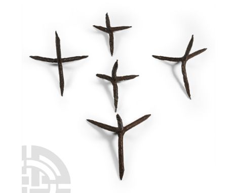 13th-14th century A.D. Each hand-forged with square-section spikes, designed so that however the item falls, one spike is alw