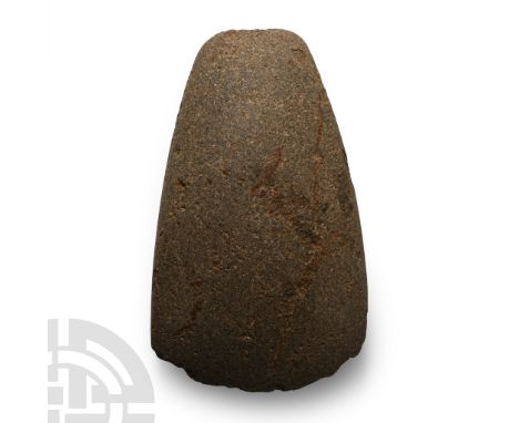 Neolithic Period, circa 4000-2300 B.P. A complete ground or polished stone axehead sub-ovate in plan, narrower at the butt en