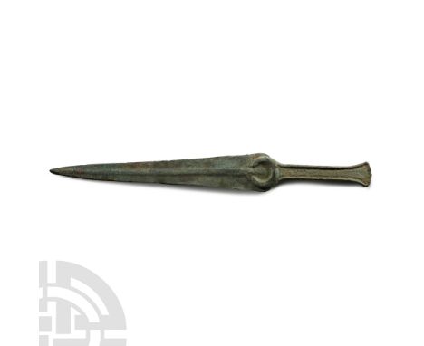 14th-10th century B.C. A short dagger with slender triangular blade, low round shallow midrib with flat upper face, annular g