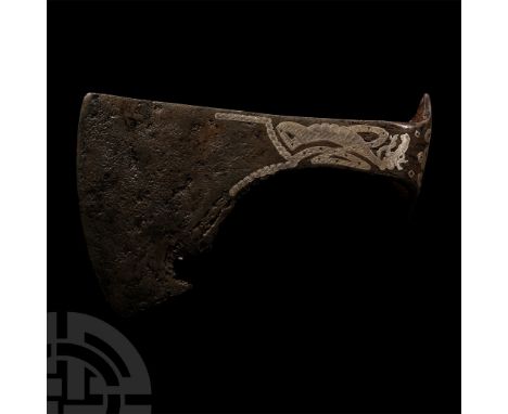 Northern Europe, 9th-11th century A.D. With short, cylindrical socket to rear, narrow neck, flared blade with curved cutting 