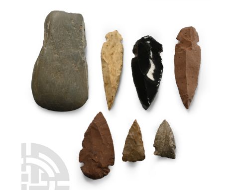 Late Archaic Period, 10,000-6,000 B.P. Including arrowhead, axehead and other types, with catalogue stickers.  154 grams tota