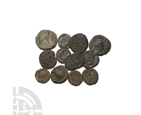 Group of Twelve [12] Roman Imperial AE Coins.. 4th century AD. Various emperors. 21.79gr total.   Near Very Fine.Found indivi